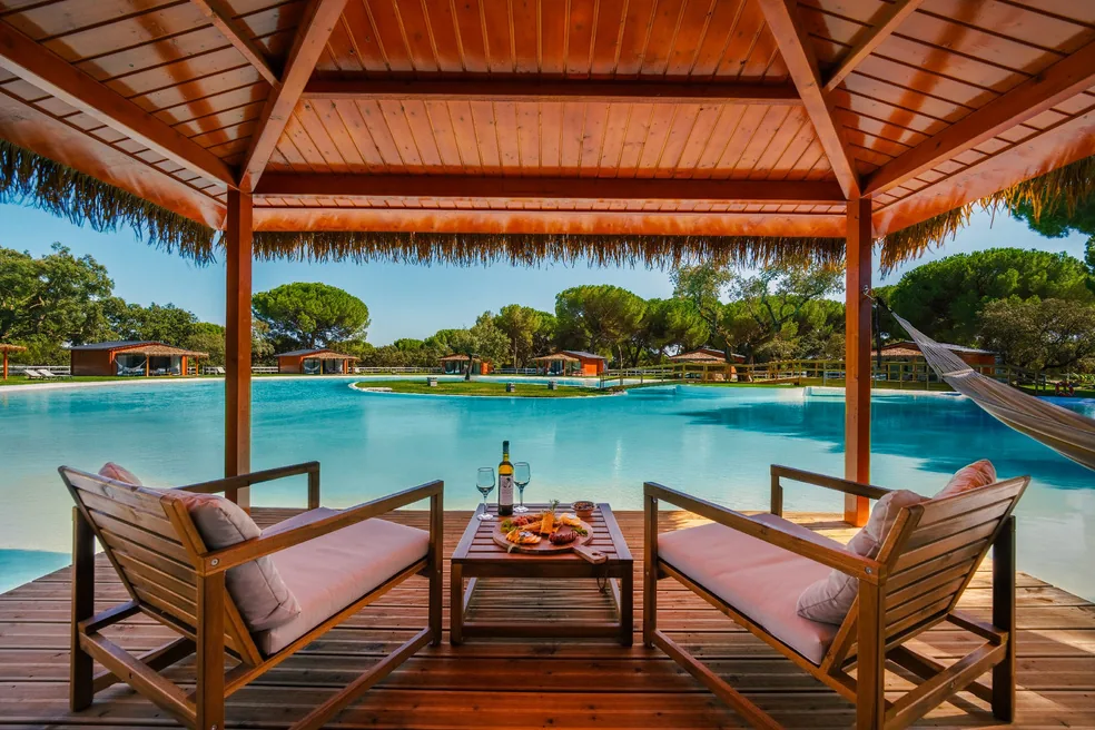 Shaded gazebo by the lake-pool